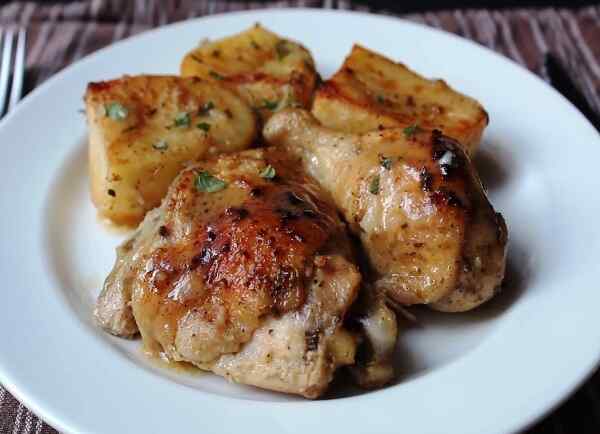 Куриные окорочка с картошкой в духовке